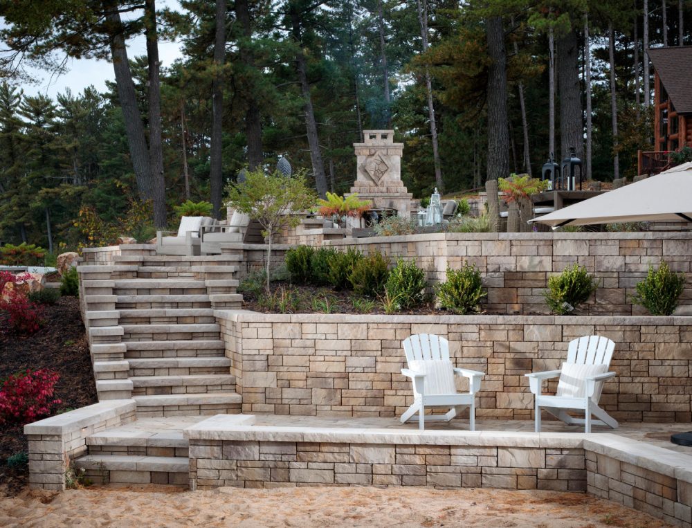paved walkway and stairs with white chairs