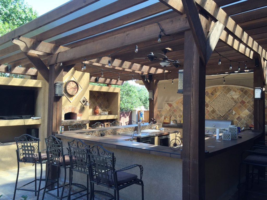 builtin kitchen with black chair stools